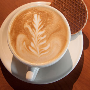 Latte with foam design of a leaf on top